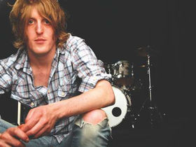 Razorlight drummer Andy Burrows auctions drum kit for charity